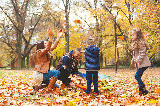 istock Happy family having fun in park. 622916710