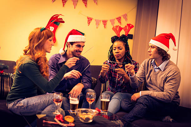istock Friends having fun with sparklers on Christmas night 622917406