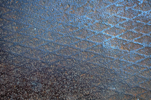 Texture of fluted rusty iron metal plate background
