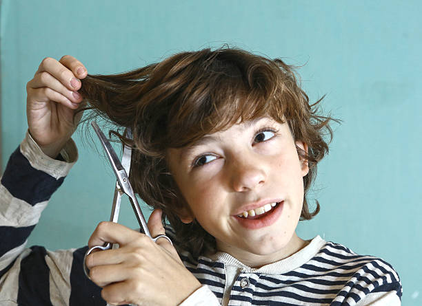 Boy Cutting Hair To Himself With Scissors Stock Photo - Download Image Now  - Cutting Hair, Hairdresser, Individuality - iStock