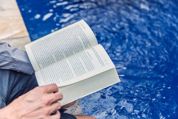 istock Adult man enjoy reading book 622921920