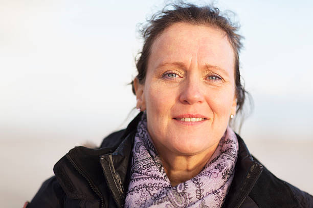 istock happy mature woman 622927090