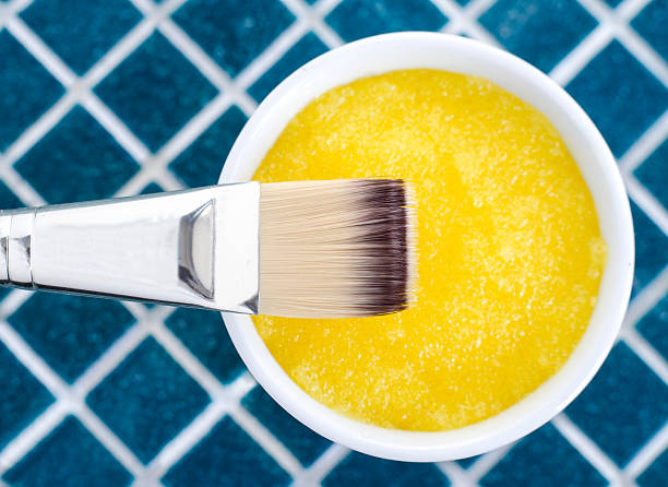 istock Yellow cosmetic mask (scrub) in a bowl 622955410