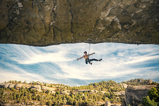 Active lifestyle. Sports in nature. Overcoming a difficult climbing route