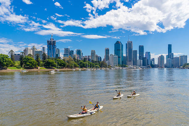 Tourists kayaking along the Brisbane River, Australia stock photo