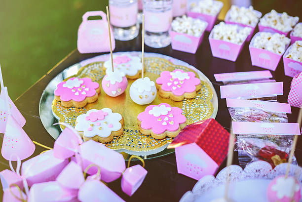 istock Dessert table at kids birthday party. Cake, candies, marshmallow 622955920