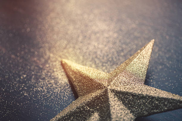 istock Christmas star on dark wooden background 622956042