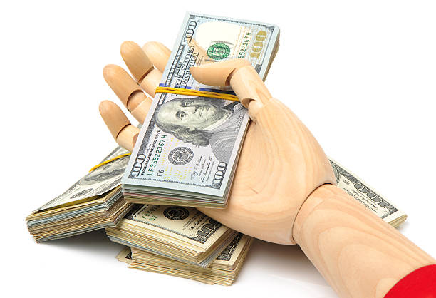 istock Many bundle of US 100 dollars bank notes 622957052