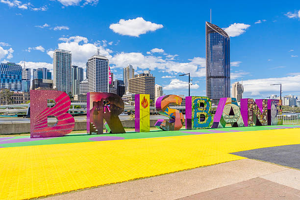 Brisbane, Australia - September 25, 2016: View of Brisbane sign with skyscrapers in the background in South Bank, Brisbane during daytime.
