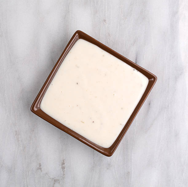 istock Small dish of Italian salad dressing on marble table top 622957420