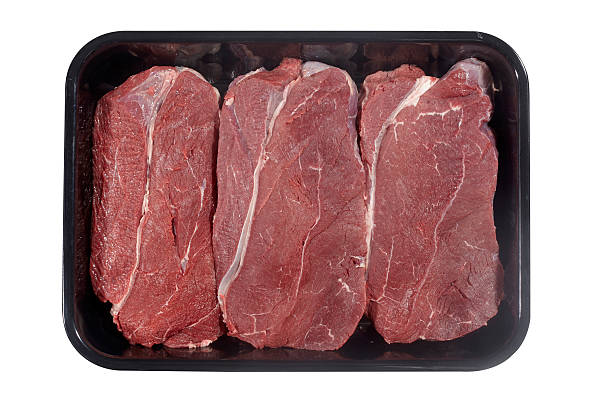 istock Supermarket plastic tray with veal isolated on white background 622957526