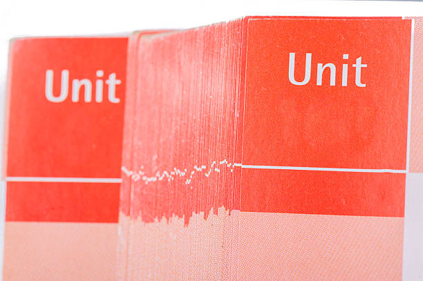 istock Pages of red school book with space for unit`s number 622958578