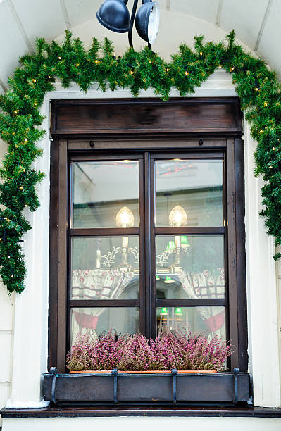 istock beautiful decorated Christmas window decoration FIR branches 622959128