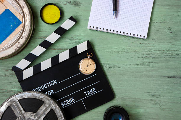istock Clapperboard and a film reel 622959574