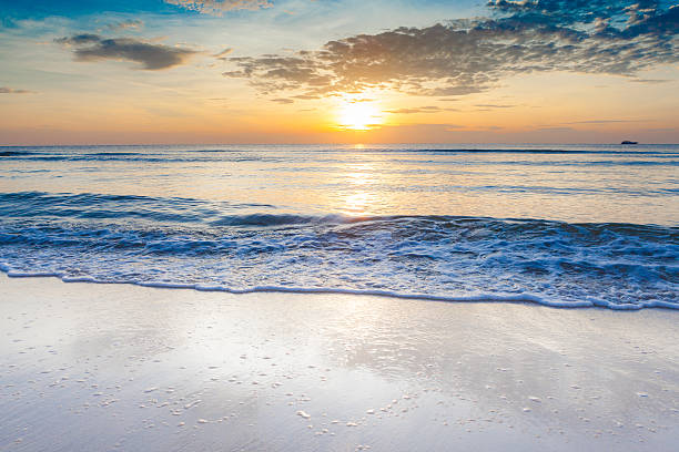 istock Bright sunrise over on the beach. 622959796