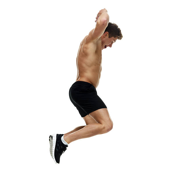 istock Shirtless muscular man jumping 622960350