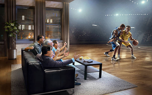 istock Adults watching very realistic Basketball game at home 622960982