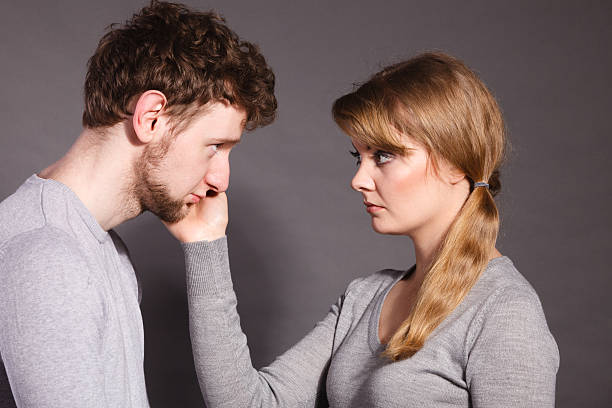 istock Sad depressed couple portrait. 622961054