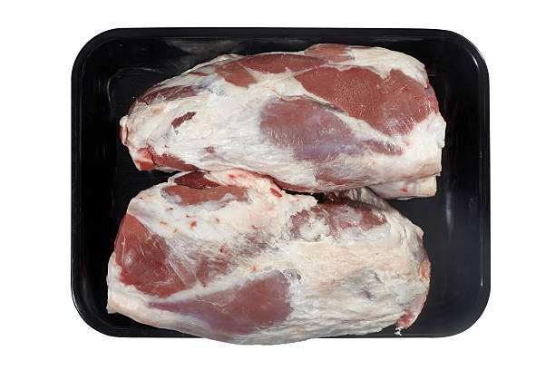 istock Plastic tray with lamb meat isolated on white background. 622964330