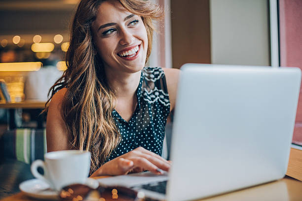 istock Happy girl with laptop 622964858
