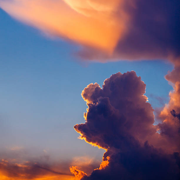 istock Illuminated by the sun clouds at sunset 622965840