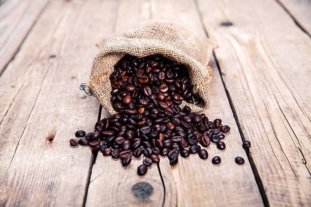 istock Coffee beans on the wooden background. Hot drinks. 622967438