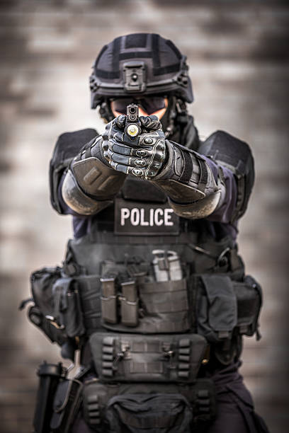 istock SWAT Police Officer Against Brick Wall 622972930