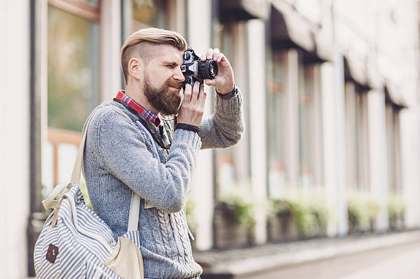 istock Young man photographer looking at camera 622973534