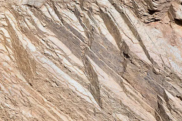 Photo of Layers of sedimentary rocks. Close up.