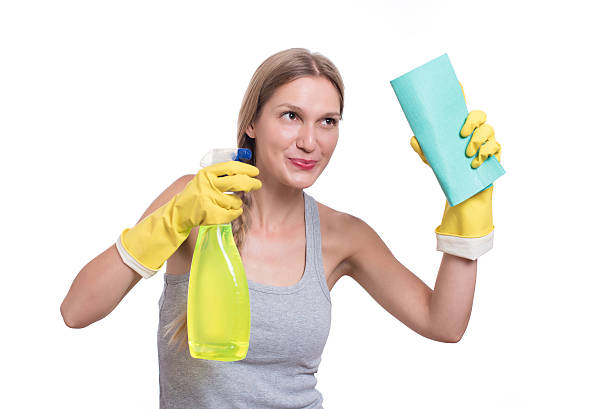 istock Young cheerful woman cleaning with rag, isolated on white backgr 622984824