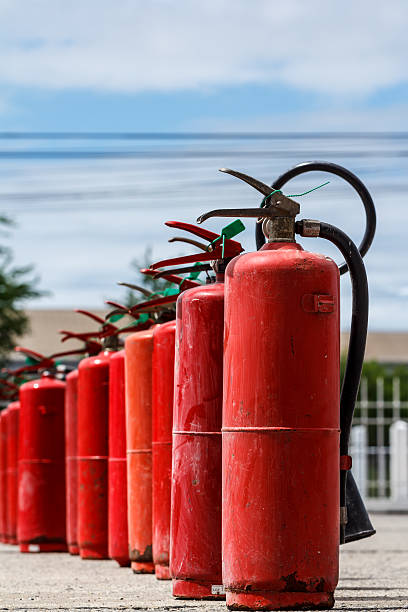istock Fire extinguisher red tank in outdoor 622989836