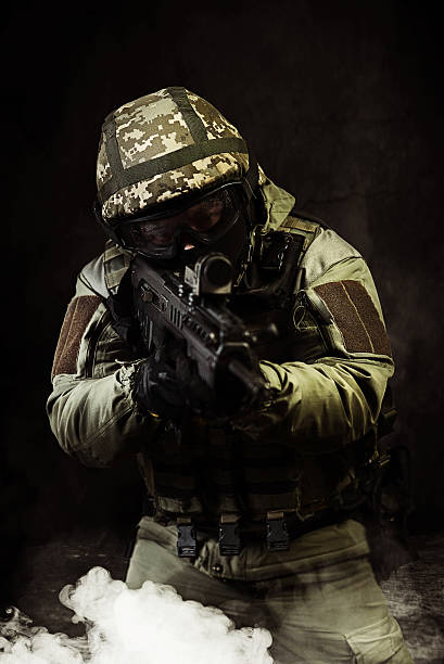 istock The man as member of the special forces with weapons 622990522