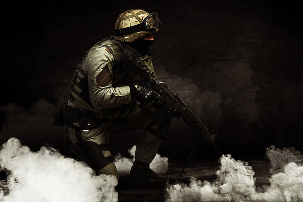 istock The man as member of the special forces with weapons 622991016