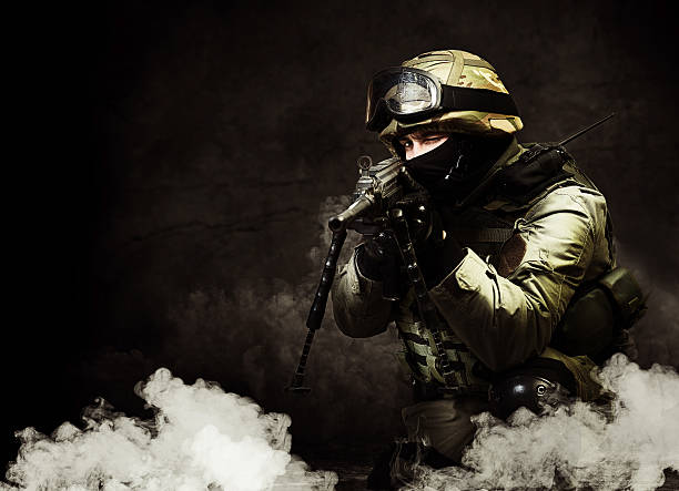 istock The man as member of the special forces with weapons 622991200