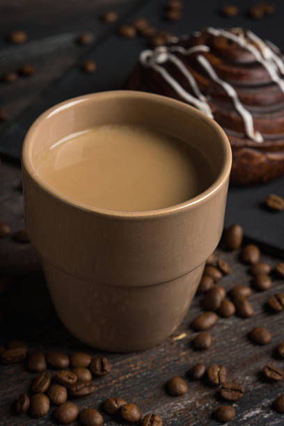 istock Cup of coffee on the rustic wooden background 622992044