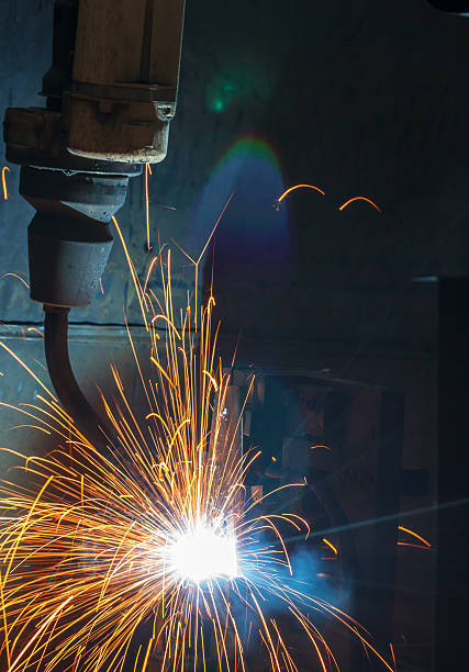 istock robots welding in a car factory 622992422
