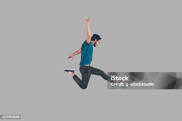 Like A Rock Star Stock Photo - Download Image Now - Jumping, Men, People