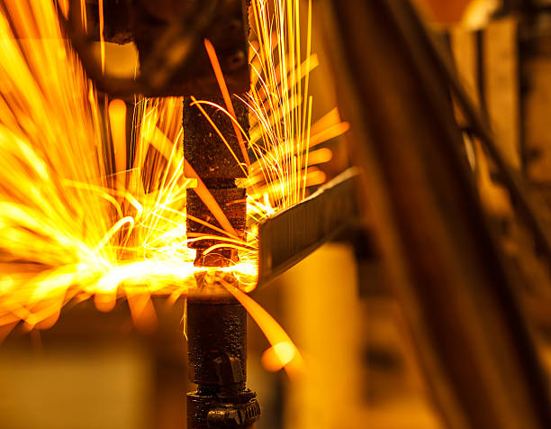 istock robots welding in a car factory 622993058