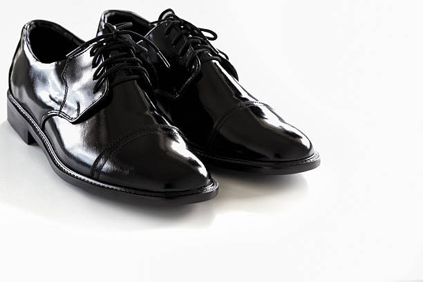istock black leather shoes on a white background 622993772