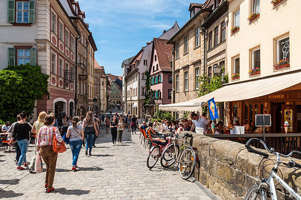 Historic city center of Bamberg Bamberg, Germany - May 22, 2016: View the beautiful old Carolinen street in the historic city. Historic city center of Bamberg is a listed UNESCO world heritage site. bamberg photos stock pictures, royalty-free photos & images
