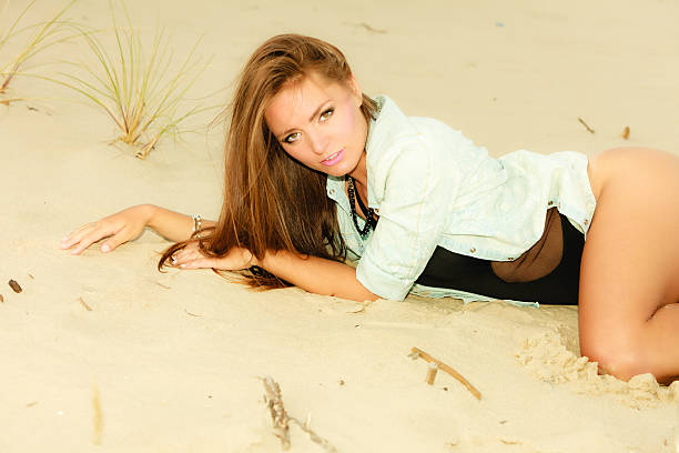 istock Long haired girl on beach, summertime 622995356