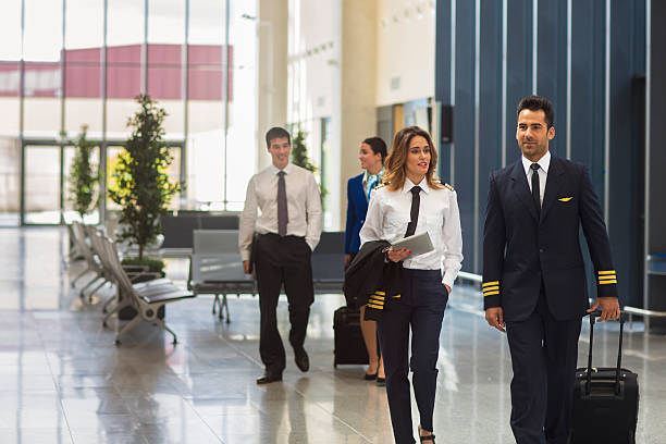 istock Flight crew preparing to go to airplane 622995836