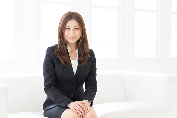 istock Businesswoman sitting on a sofa 623058180