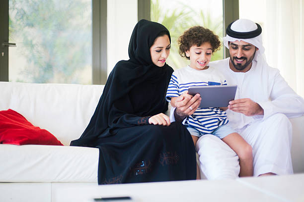 istock Family portrait sitting in the sofa. 623058250