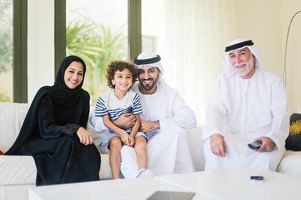 istock Family portrait sitting in the sofa. 623058476