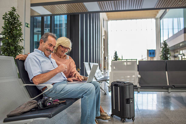 istock Seniors talking to family before flying 623059382
