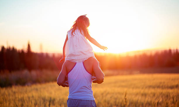istock Dad and daughter at sunset 623059584