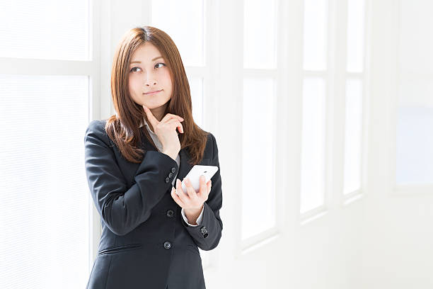 istock Businesswoman using a smartphone 623060070