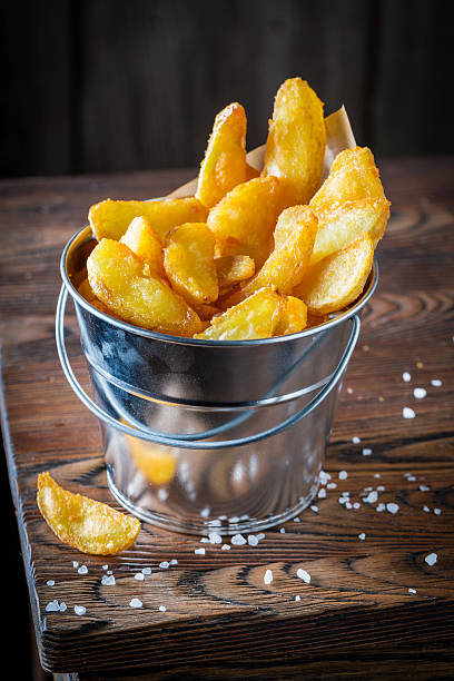 istock Tasty chips with salt made of fresh potato 623061030