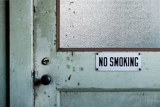 istock No Smoking Sign on Vintage Door 623062432